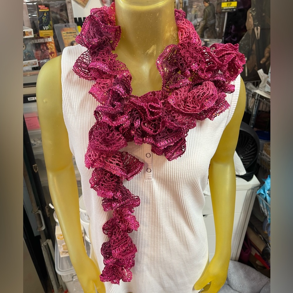 Very pretty frilly scarf with sequins